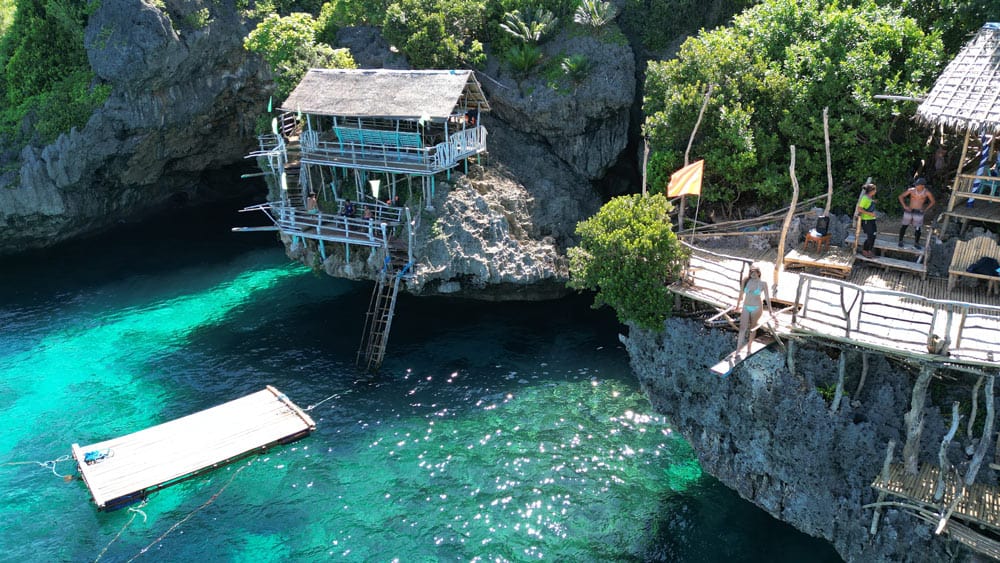 cliff jumping in Cathedral Cave, Carabao