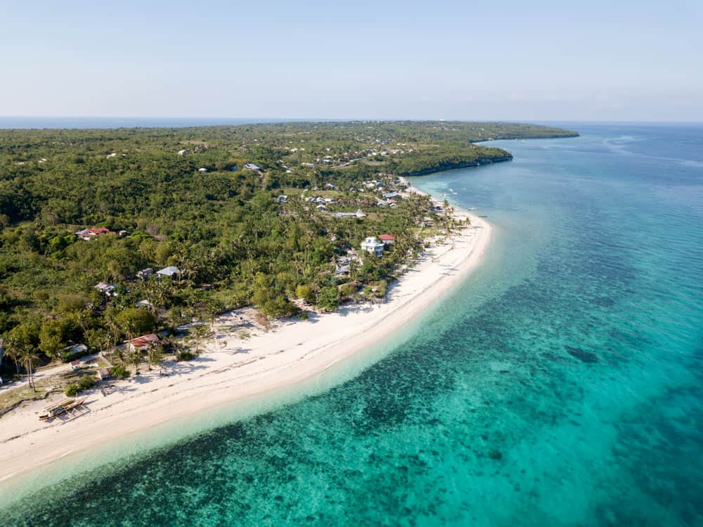 White sand beaches and crystal-clear waters in Kinatarkan
