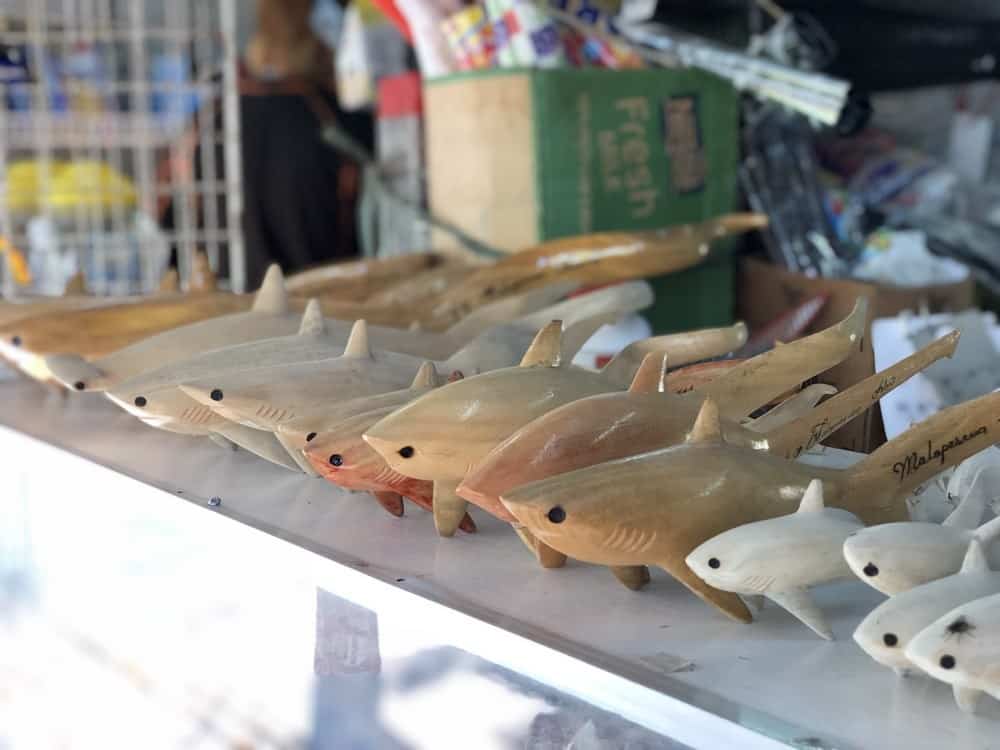 carved figures of a thresher shark in Malapascua